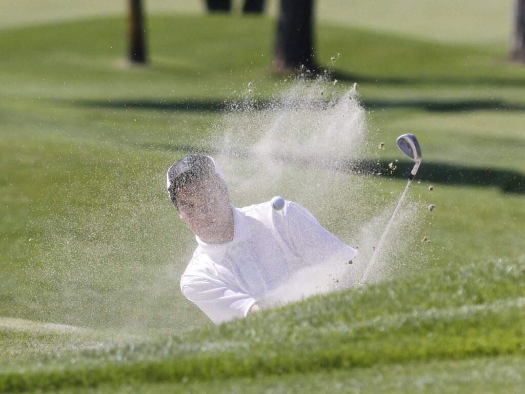 Golfing at public and private courses in the North Bay seem to be stuck in a sand trap, like this duffer at Sonoma Golf Club. (Bill Hoban/Special to the Index-Tribune)