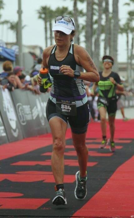 SUBMITTED PHOTOPetaluma's Holly Wick nears the finish line in the Oceanside 70.3 (half ironman) where she qualified for the World Championships by winning her age division.
