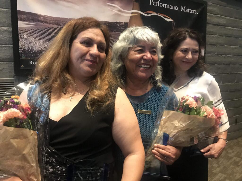 From left to right, recipients of Los Ciens first-ever Puente & Ganas Awards Nohemi Palomino Andrade, Alicia Sanchez and Gabriela Bernal pose for a photograph Friday, May 3, 2019 at the Luther Burbank Center for the Arts in Santa Rosa. (Nashelly Chavez/ Press Democrat)