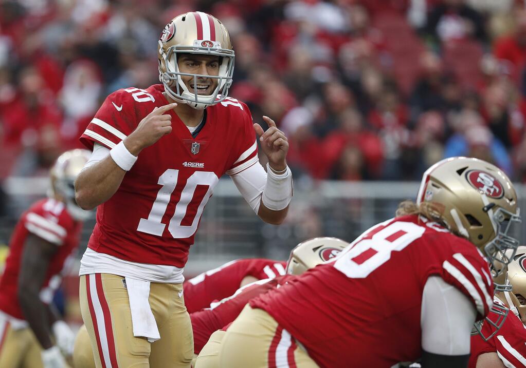 San Francisco 49ers quarterback Jimmy Garoppolo gestures at the line of scrimmage during the second half against the Jacksonville Jaguars in Santa Clara, Sunday, Dec. 24, 2017. (AP Photo/Tony Avelar)