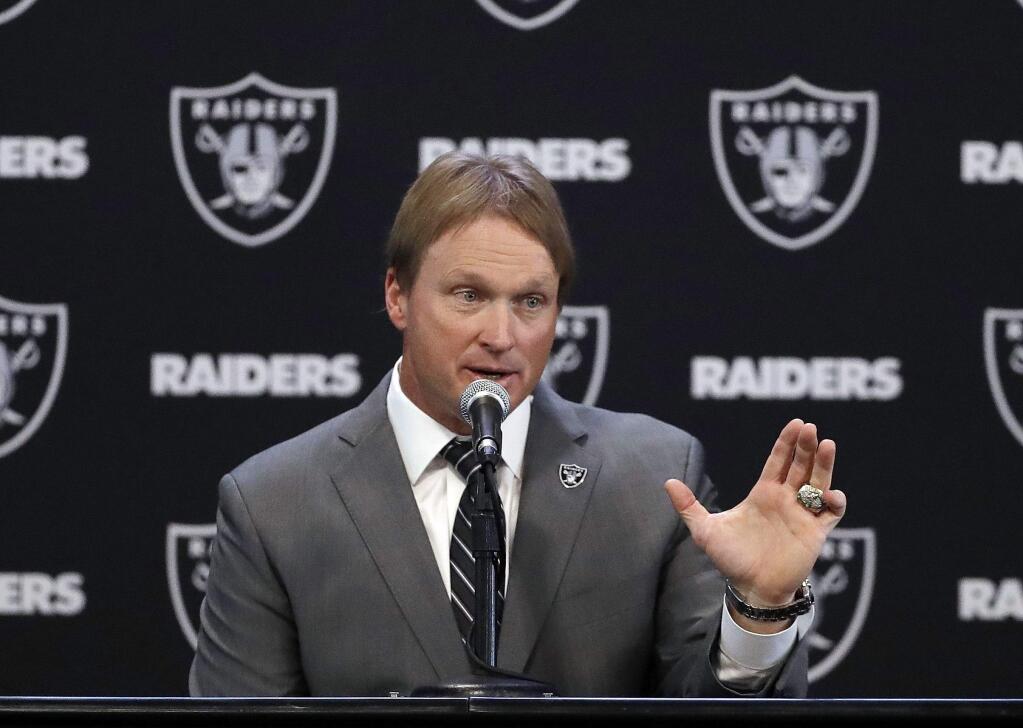 Oakland Raiders head coach Jon Gruden answers questions during a press conference Tuesday, Jan. 9, 2018, in Alameda. (AP Photo/Marcio Jose Sanchez)