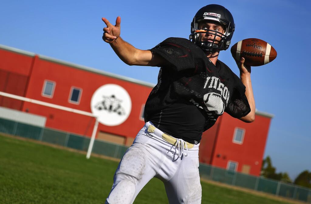Windsor quarterback Max Brown passes the ball during practice, in Windsor, on Monday, August 24, 2015. (Christopher Chung/ The Press Democrat)