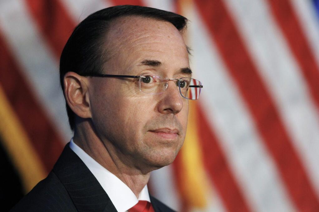 FILE - In this June 20, 2017, file photo, Deputy Attorney General Rod Rosenstein listens during the Justice Department's National Summit on Crime Reduction and Public Safety in Bethesda, Md. Former Deputy Attorney General Rosenstein told the FBI he was 'angry, ashamed, horrified and embarrassed' at the way James Comey was fired as FBI director. An FBI summary of that interview was among hundreds of pages of documents released Monday, Dec. 2, 2019, as part of a public records lawsuit brought by BuzzFeed News and CNN. (AP Photo/Jacquelyn Martin, File)