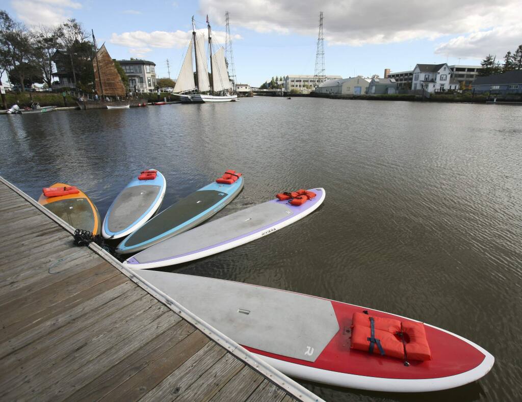 Stand Up Paddleboards parked at the dock just down from historic ships during River Heritage Days in Petaluma on Saturday, October 18, 2014. (SCOTT MANCHESTER/ARGUS-COURIER STAFF)