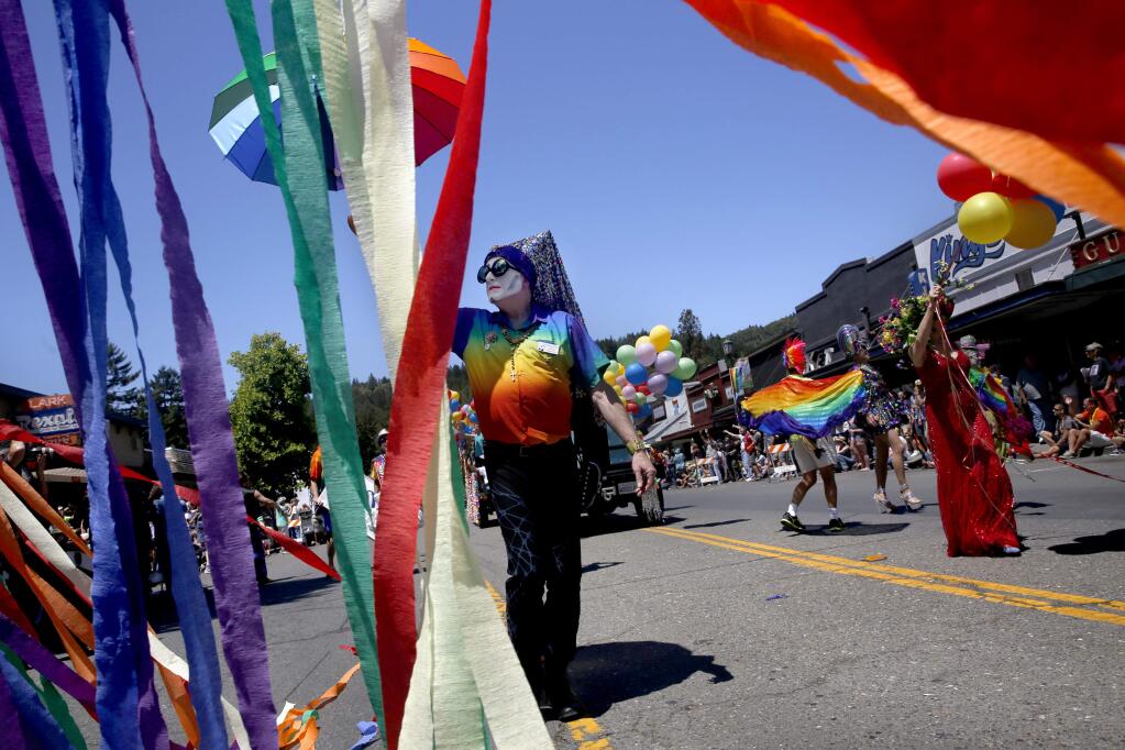 Jim Nichols dressed as Sister Beatrix Uppersleeve of the Russian River Sisters of Perpetual Indulgence takes part in the Sonoma County Pride Parade in Guerneville, on Sunday, June 7, 2015. (BETH SCHLANKER/ The Press Democrat)