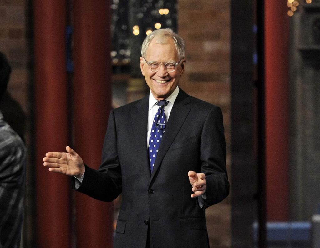 In this image released by CBS, David Letterman appears during a taping of his final 'Late Show with David Letterman,' Wednesday, May 20, 2015 at the Ed Sullivan Theater in New York. After 33 years in late night television, 6,028 broadcasts, nearly 20,000 total guest appearances, 16 Emmy Awards and more than 4,600 career Top Ten Lists, David Letterman is retiring. (Jeffrey R. Staab/CBS via AP)