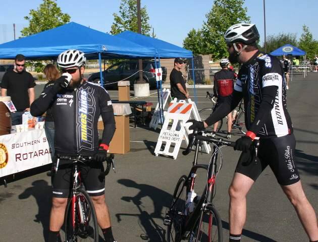 (Bob Tuttle/Argus-Courier File Photo)Southern Sonoma County Rotaract distributes coffee before riders hit the road at the Petaluma Sunrise Rotary's 3rd Annual Backroads' Challenge on Saturday May 18th, 2013. Bicyclists rode one of three challenging courses with distances from 35 to 100 miles through rural Sonoma and Marin Counties.
