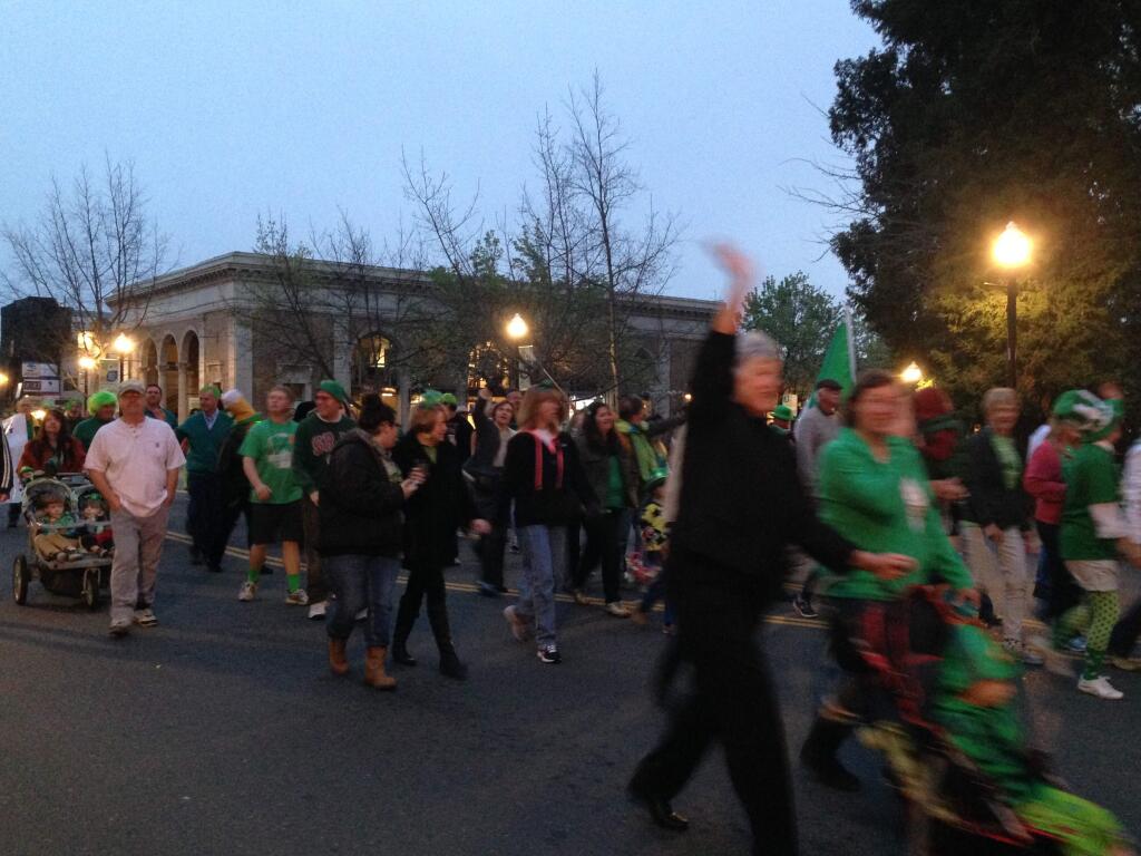 Revelers walk in the St. Patrick's Day parade in Healdsburg on Tuesday, March 17, 2015. (RANDI ROSSMANN/ PD)
