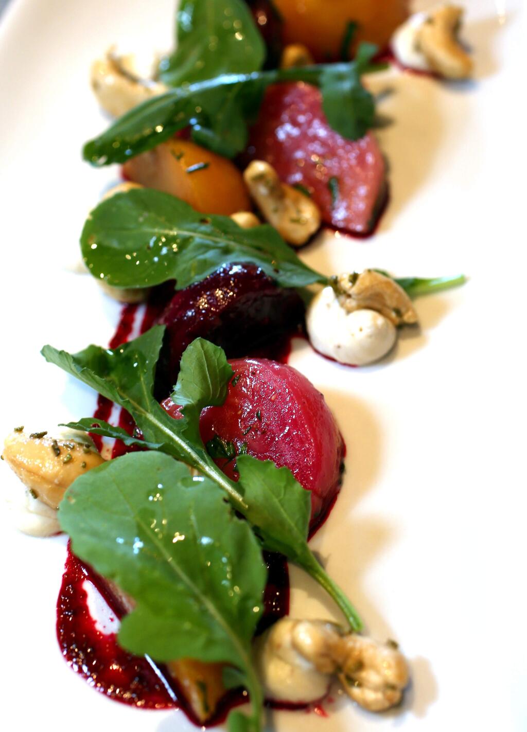 County Line Beets with Redwood Hill Chèvre, wild arugula, rosemary cashews and Cabernet vinaigrette served at Earth's Bounty Kitchen and Wine Bar in Santa Rosa, Tuesday, September 23, 2014. (Crista Jeremiason / The Press Democrat)
