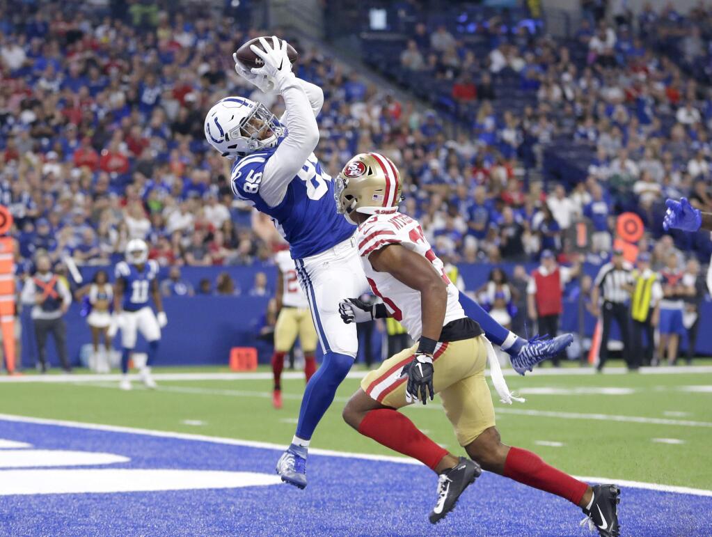 Indianapolis Colts tight end Eric Ebron makes a catch in the end zone over San Francisco 49ers cornerback Ahkello Witherspoon for a touchdown in the first half of a preseason game in Indianapolis, Saturday, Aug. 25, 2018. (AP Photo/AJ Mast)