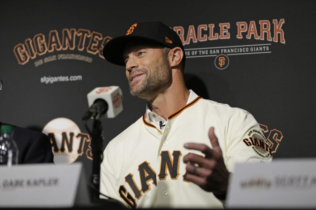 San Francisco Giants manager Gabe Kapler during a news conference at Oracle Park Wednesday, Nov. 13, 2019, in San Francisco. Kapler has been hired as manager of the San Francisco Giants, a month after being fired from the same job by the Philadelphia Phillies. Kapler replaces Bruce Bochy, who retired at the end of the season following 13 years and three championships with San Francisco. (AP Photo/Eric Risberg)