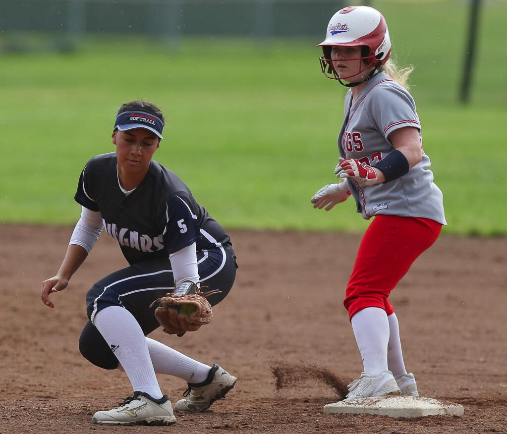 Montgomery's Jessica Celli is safe at second, as Rancho Cotate's Reilani Peleti catches the ball away from the base, in Rohnert Park, on Thursday, May 5, 2016. (Christopher Chung/ The Press Democrat)