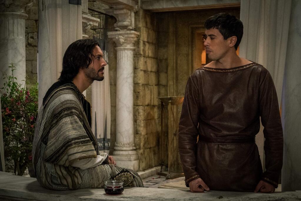 This image released by Paramount Pictures shows Jack Huston as Judah Ben-Hur, left, and Toby Kebbell as Messala Severus in a scene from 'Ben-Hur.' (Philippe Antonello/Paramount Pictures via AP)