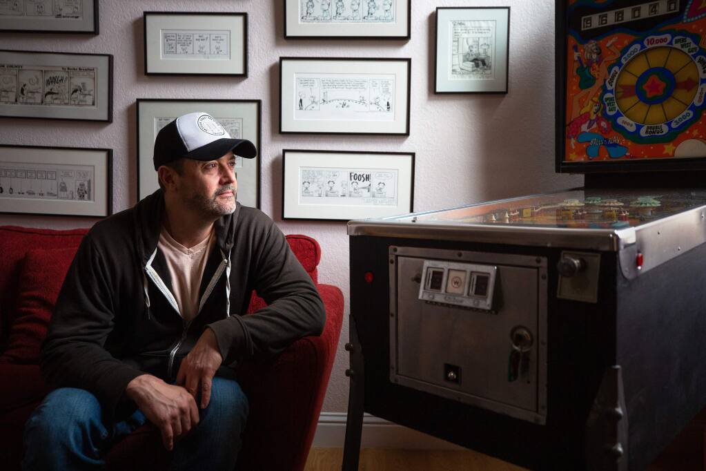 Cartoonist Stephan Pastis, creator of the nationally syndicated “Pearls Before Swine” comic strip, poses for a portrait at his studio in Santa Rosa in 2020. (Alvin A.H. Jornada / The Press Democrat)
