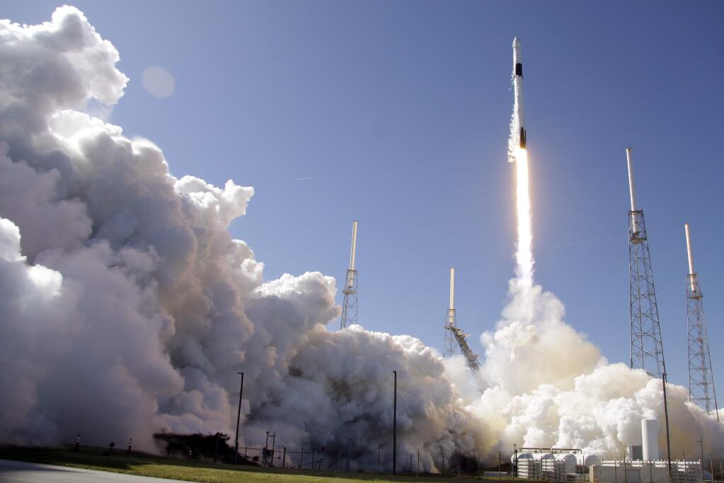 A Falcon 9 SpaceX rocket on a resupply mission to the International Space Station lifts off from Space Launch Complex 40 at Cape Canaveral Air Force Station in Cape Canaveral, Fla., Thursday, Dec. 5, 2019. (AP Photo/John Raoux)