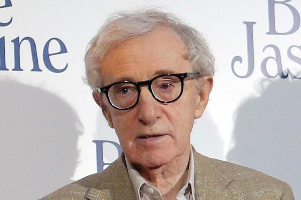 FILE - This Aug. 27, 2013 file photo shows director and actor Woody Allen at the French premiere of 'Blue Jasmine,' in Paris. Amazon Studios is delivering Woody Allen as creator of his first-ever TV series. The veteran filmmaker will write and direct all of the episodes of the half-hour series. A full season has been ordered for Amazon's Prime Instant Video, the company announced Tuesday, Jan. 13, 2015.(AP Photo/Christophe Ena, File)