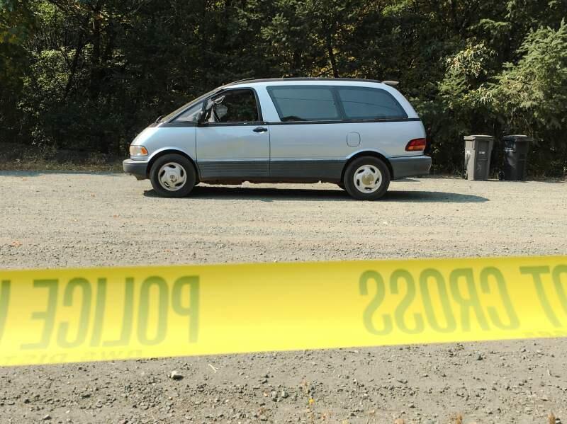 The Toyota Previa in which authorities believe Antonio Botello-Arreola was shot on Porter Creek Road, Friday, Sept. 1, 2017. (NICK RAHAIM/ PD)