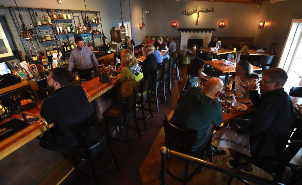 The busy bar in the late afternoon at the Salt & Stone, Kenwood's gathering place. (photo by John Burgess/The Press Democrat)