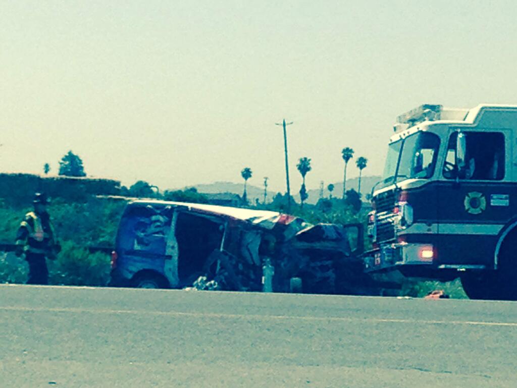 A driver believed to be from Sonoma County was seriously injured Thursday, June 11, 2015, when a Nissan work van crossed into oncoming traffic and collided with a Cadillac Escalade driven by a Phoenix man. (Reader-submitted photo)