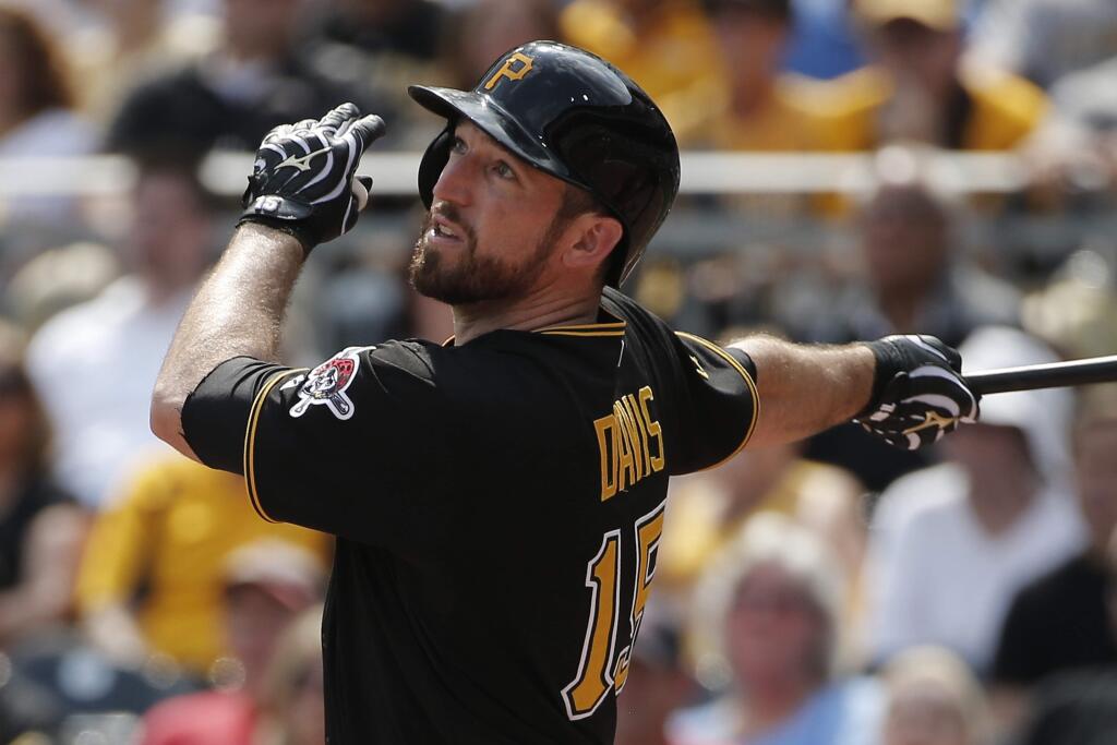 In this Aug. 27, 2014, file photo, Pittsburgh Pirates' Ike Davis (15) bats during the fourth inning of a baseball game against the St. Louis Cardinals in Pittsburgh. (AP Photo/Gene J. Puskar)