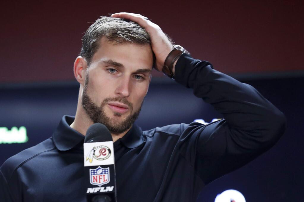 Washington Redskins quarterback Kirk Cousins answers questions at a press conference in Landover, Md., Sunday, Oct. 29, 2017. The Dallas Cowboys defeated the Washington Redskins 33-19. (AP Photo/Alex Brandon)