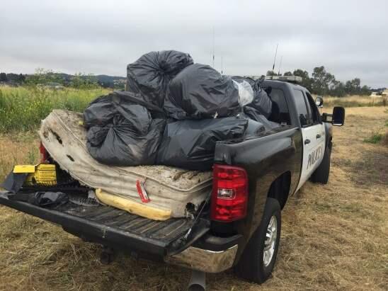 Petaluma police and local volunteers cleaned up six homeless encampments at Shollenberger Park and Hopper Street Sept. 24. (Photo courtesy of Petaluma Police Department)