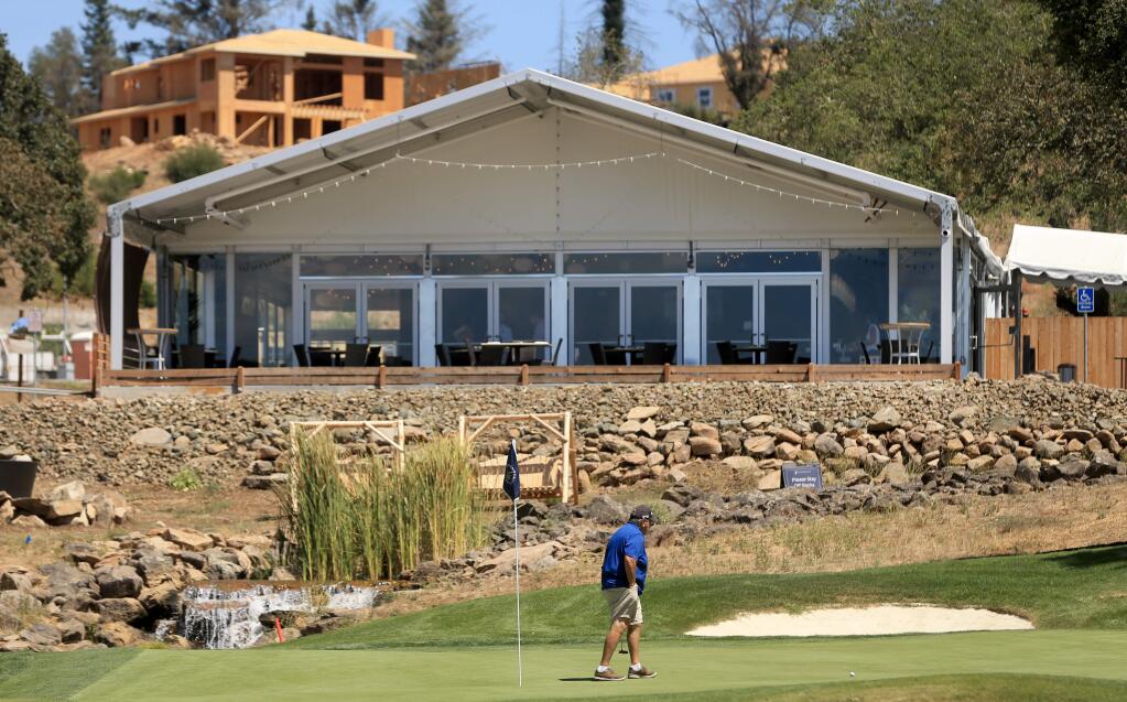 The Fountaingrove Club in Santa Rosa suffered substantial losses due to the Tubbs fire, but a structure called the Sunset Grill was built, sandwiched between the driving range and the ninth hole, Thursday, Aug. 22, 2019 in Santa Rosa. (Kent Porter / The Press Democrat) 2019