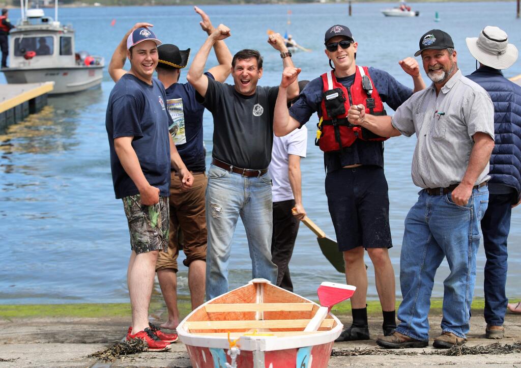 Wesley Albini, Christophe Zbinden, Eric Calley and Steve Perucci celebrate their win at the 46th Annual Bodega Bay Fisherman's Festival at Westside Park in Bodega Bay on Saturday, May 4, 2019. The festival returns to the park for its 49th year on April 30 and May 1 this year. (Will Bucquoy/For The Press Democrat file)