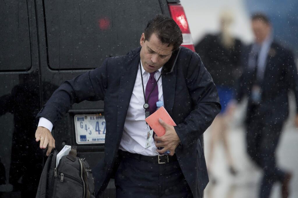 White House communications director Anthony Scaramucci arrives at Andrews Air Force Base, Md., Friday, July 28, 2017, to board Air Force One to travel with President Donald Trump to Brentwood, N.Y. close to where the ultra-violent street gang MS-13 has committed a string of gruesome murders. (AP Andrew Harnik)