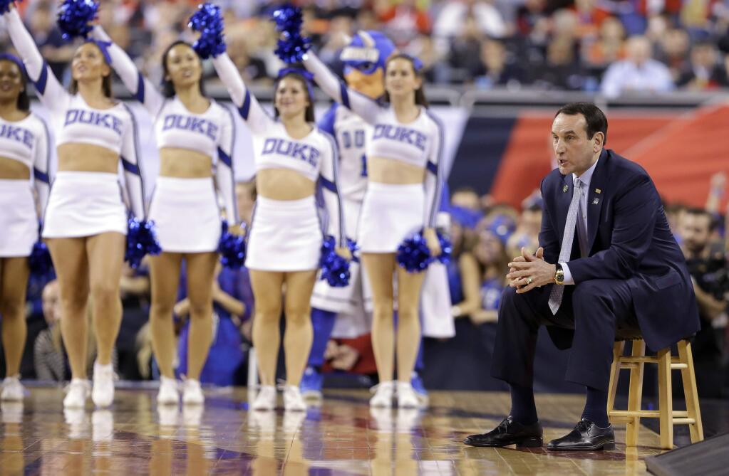 Duke head coach Mike Krzyzewski looks on from the bench during the first half of the 2015 NCAA Final Four championship game against Wisconsin in Indianapolis. (AP Photo/Michael Conroy)