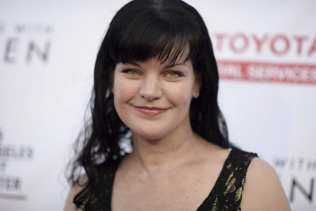 FILE - In this May 21, 2016 file photo, Pauley Perrette attends 'An Evening with Women' held at the Hollywood Palladium in Los Angeles. Perrette says CBS has always been good to her and has always had her back, days after she said she suffered “multiple physical assaults” before leaving “NCIS” after 15 seasons. Perrette tweeted Tuesday, May 15, 2018, after CBS said that Perrette had “a workplace concern” more than a year ago, and the company took the matter seriously and worked with her to find a resolution. (Photo by Richard Shotwell/Invision/AP, File)