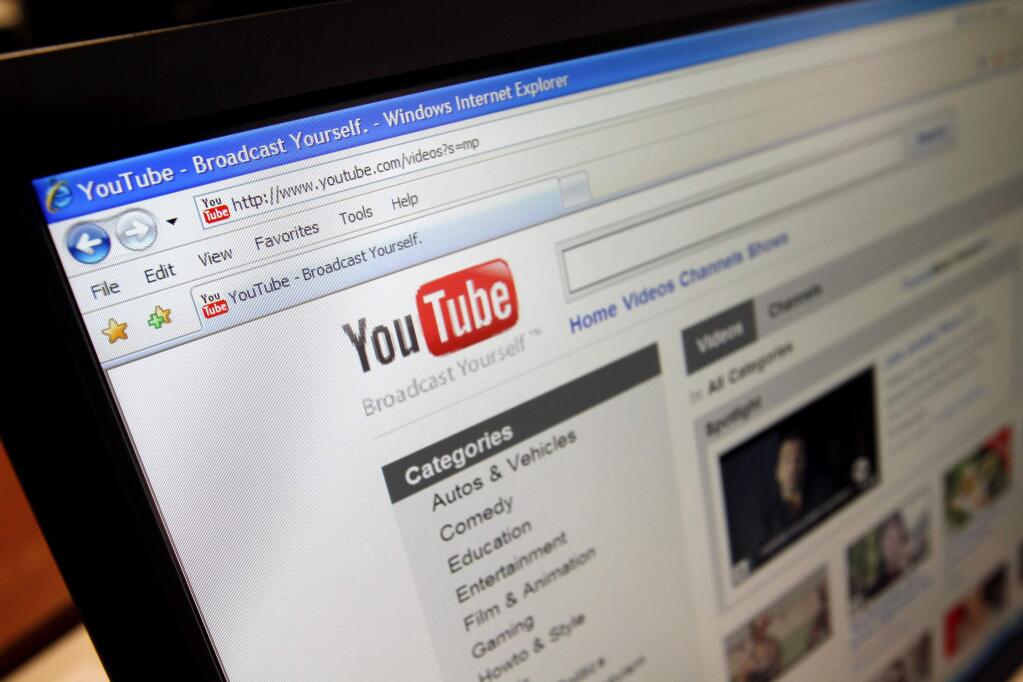 FILE - This March 18, 2010, file photo shows the YouTube website in Los Angeles. AT&T, Verizon and several other major advertisers are suspending their marketing campaigns on Google's YouTube site after discovering their brands have been appearing alongside videos promoting terrorism and other unsavory subjects. (AP Photo/Richard Vogel, File)