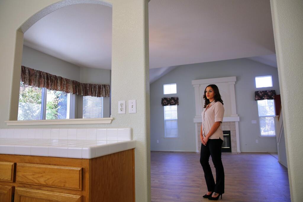 Dede's Rentals property manager Ana Perez, in a single-family rental home in northwest Santa Rosa, has witnessed an increase in demand in the rental housing market. (Christopher Chung/ The Press Democrat)