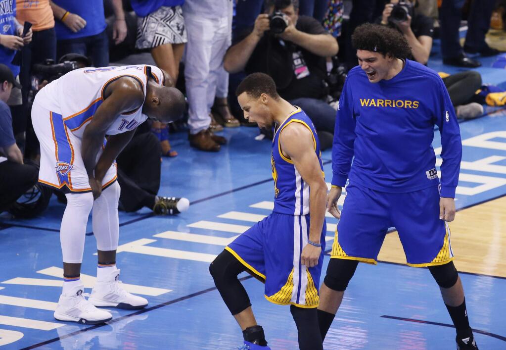 Golden State Warriors guard Stephen Curry (30) and forward Anderson Varejao (18) celebrate as Oklahoma City Thunder forward Serge Ibaka (9) reacts during the second half in Game 6 of the NBA basketball Western Conference finals in Oklahoma City, Saturday, May 28, 2016. The Warriors won 108-101. (AP Photo/Sue Ogrocki)