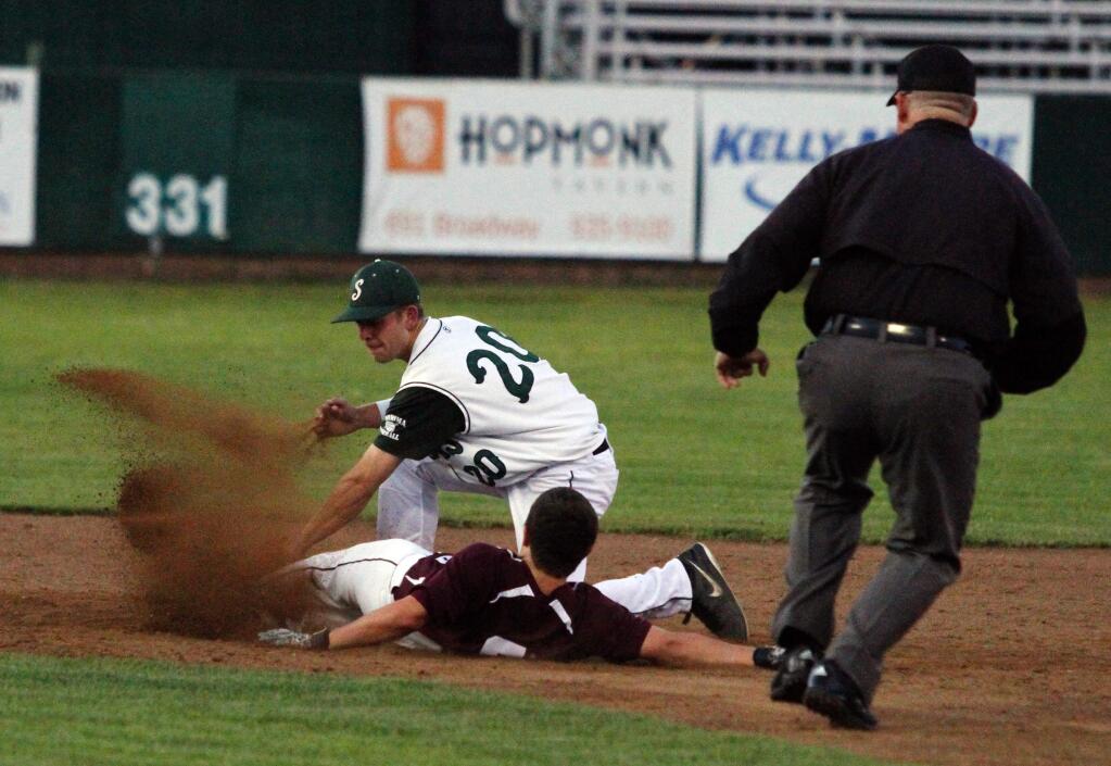 Bill Hoban/Index-TribuneSonoma's CJ Vitale tags out a runner at second base during the Dragons SCL shutout win over Piner Friday night at Arnold Field.
