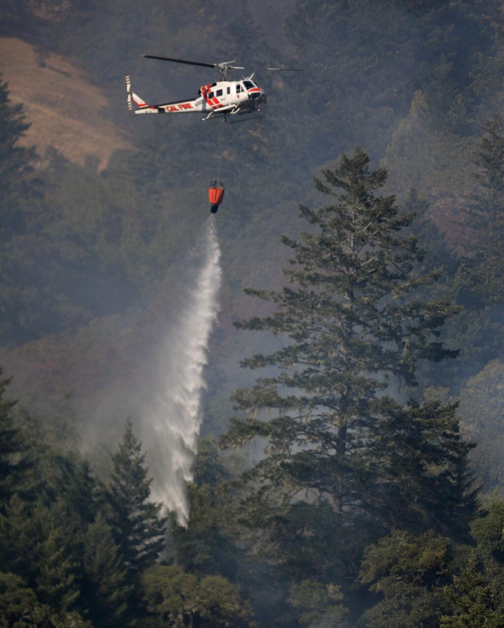 The Howard Forest, Cal Fire helicopter is used to control the Vineyard fire, Tuesday, June 9, 2020 in Mendocino County. (Kent Porter / The Press Democrat) 2020