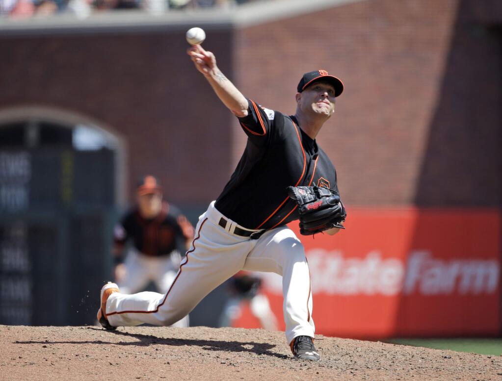 San Francisco Giants starting pitcher Tim Hudson throws to the Los Angeles Angels during the sixth inning of a game on Saturday, May 2, 2015, in San Francisco. (AP Photo/Marcio Jose Sanchez)