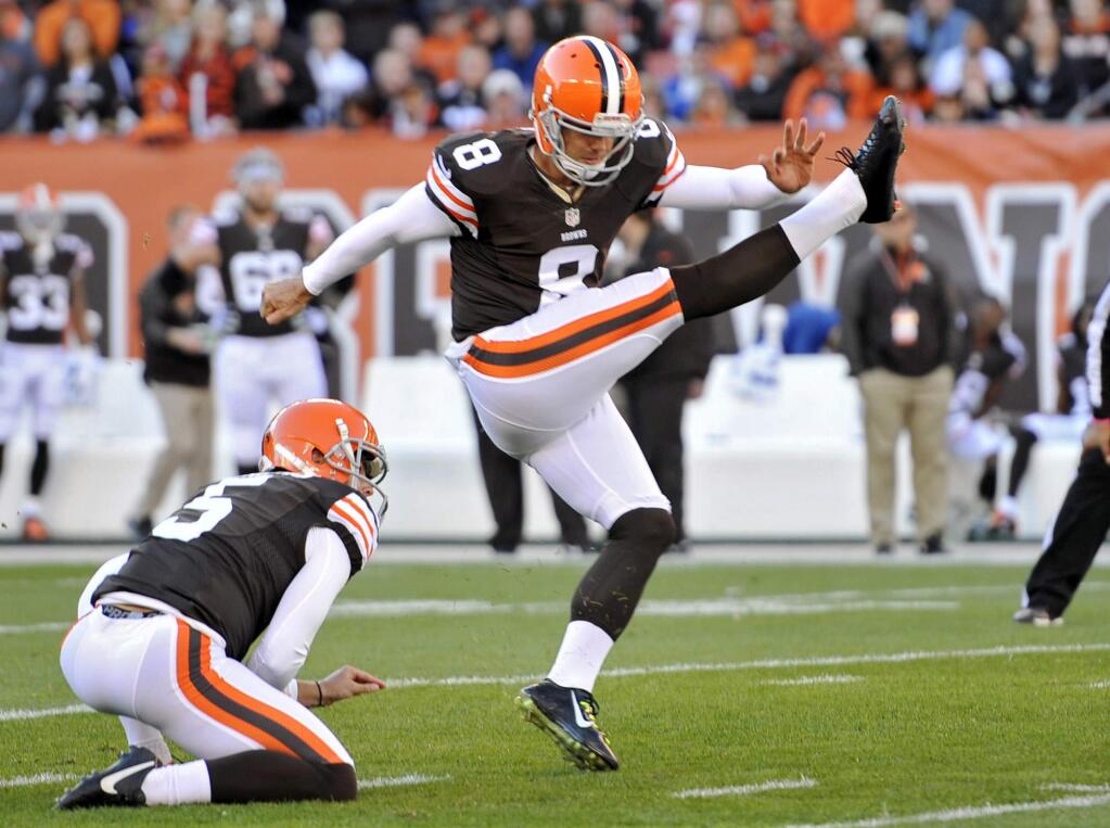 Cleveland Browns kicker Billy Cundiff (8) follows through on a 52-yard field goal against the Oakland Raiders in the first quarter of an NFL football game Sunday, Oct. 26, 2014, in Cleveland. (AP Photo/David Richard)