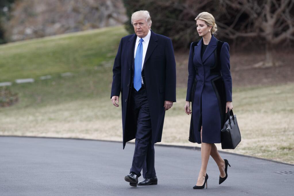 FILE - In this Feb. 1, 2017 file photo, President Donald Trump and his daughter Ivanka Trump walk to board Marine One on the South Lawn of the White House in Washington. (AP Photo/Evan Vucci, File)