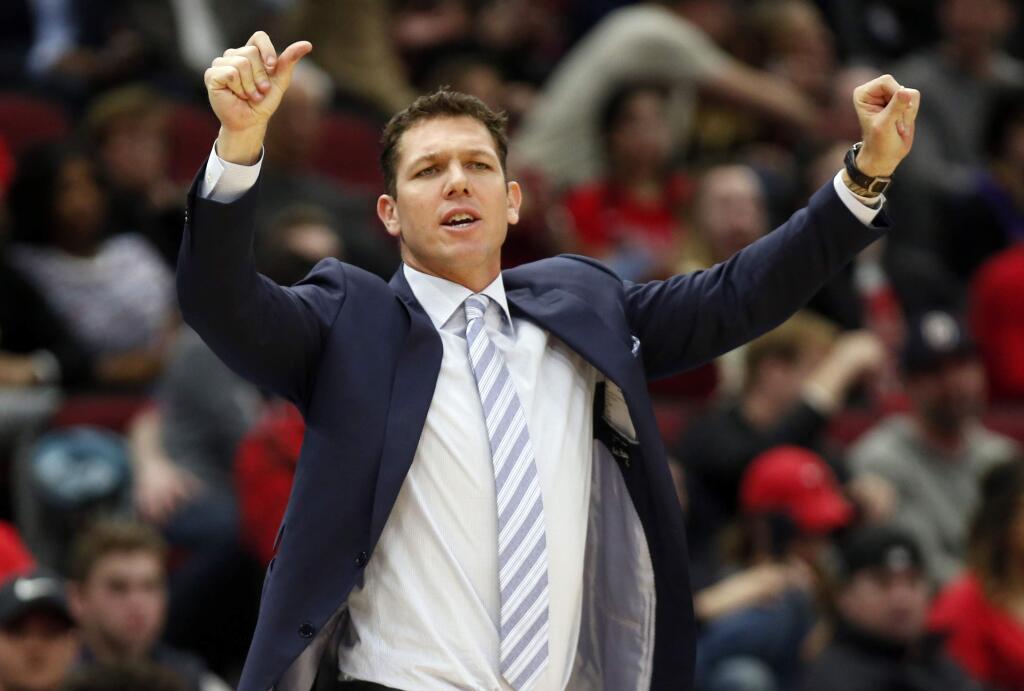 In this March 12, 2019, file photo, Los Angeles Lakers coach Luke Walton gestures to players during the second half against the Chicago Bulls in Chicago. (AP Photo/Nuccio DiNuzzo,File)