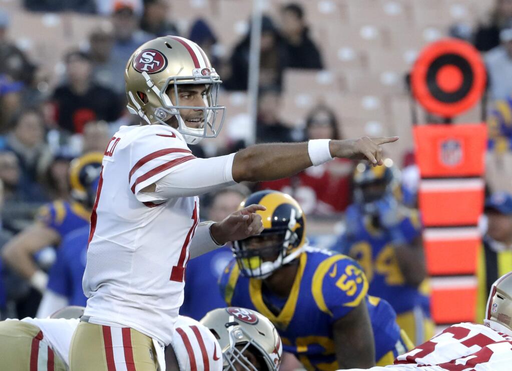 San Francisco 49ers quarterback Jimmy Garoppolo against the Los Angeles Rams during the first half Sunday, Dec. 31, 2017, in Los Angeles. (AP Photo/Rick Scuteri)