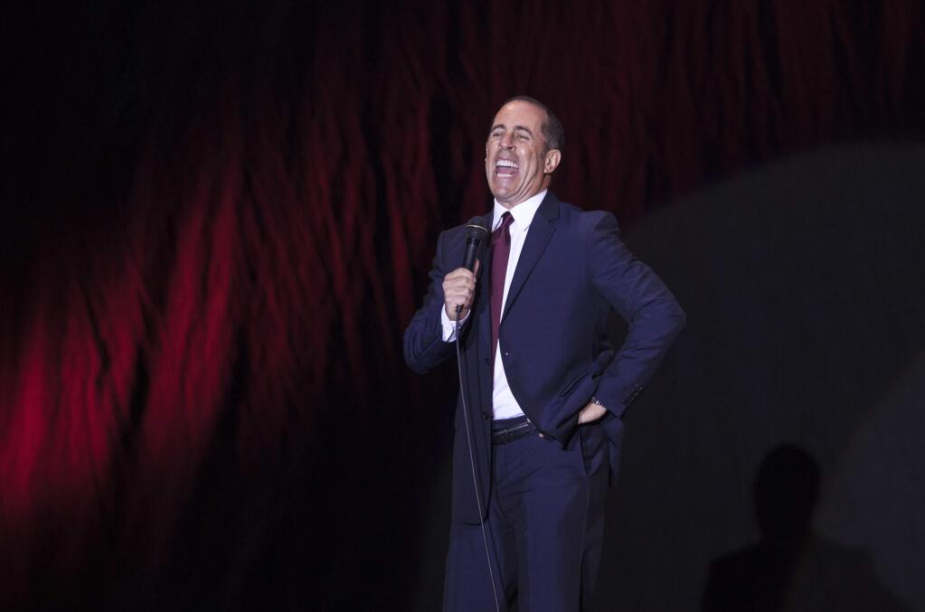 FILE - In this Dec. 19, 2015, file photo, Jerry Seinfeld performs at Menora Stadium in Tel Aviv, Israel. Seinfeld and Netflix announced a deal on Jan. 17, 2017, that will bring the star's interview show “Comedians in Cars Getting Coffee” to the streaming service later this year. (AP Photo/Dan Balilty, File)