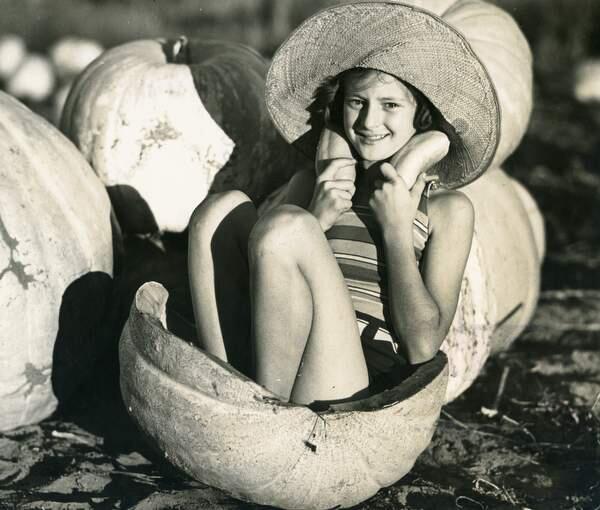 Ethel Matteri sitting in the giant pumpkin, promoting the annual Halloween parade that went from Center Park to McNear Park in Petaluma. (Argus Courier Archives, 1937)