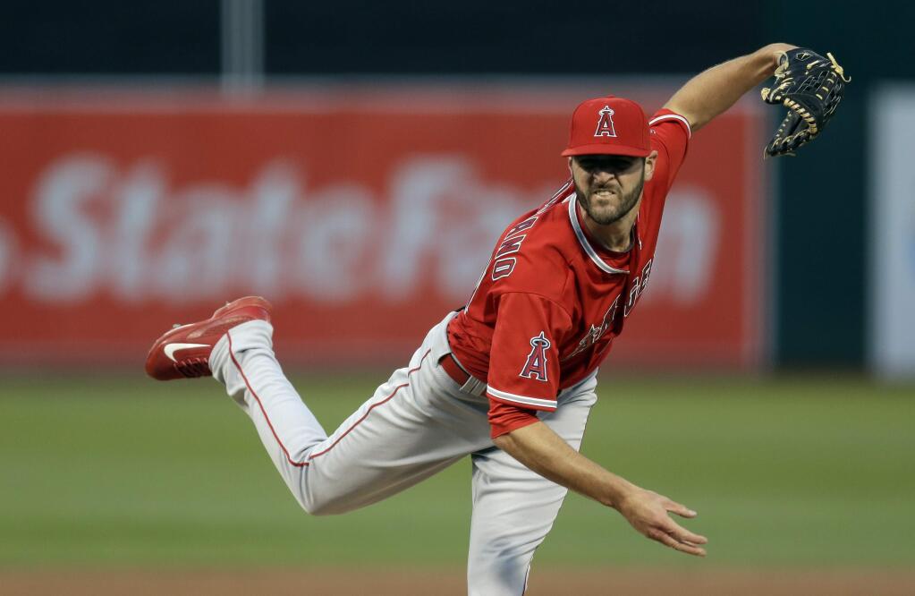 Los Angeles Angels pitcher Nick Tropeano works against the Oakland Athletics in the first inning of a baseball game Monday, April 11, 2016, in Oakland, Calif. (AP Photo/Ben Margot)