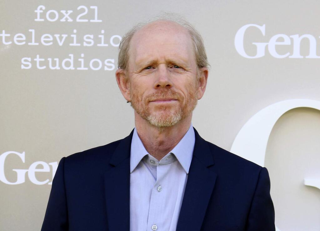 FILE - In this April 24, 2017 file photo, filmmaker Ron Howard arrives at the premiere of 'Genius', in Los Angeles. Howard is taking command of the Han Solo ‚ÄúStar Wars‚Äù spinoff after the surprise departure of directors Phil Lord and Christopher Miller. Lucasfilm announced their replacement director Thursday, June 22, two days after Lord and Miller left the project over creative differences. (Photo by Willy Sanjuan/Invision/AP, File)
