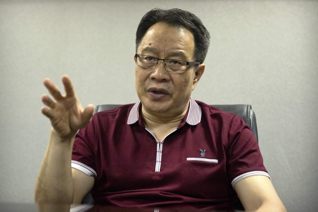 Mo Shaoping, the former lawyer of Chinese dissident and Nobel Peace laureate Liu Xiaobo, speaks during an interview in his law offices in Beijing, Monday, June 26, 2017. Jailed Chinese Nobel Peace laureate and dissident Liu has been transferred to a hospital following a diagnosis of late-stage liver cancer, Mo said Monday. (AP Photo/Mark Schiefelbein)