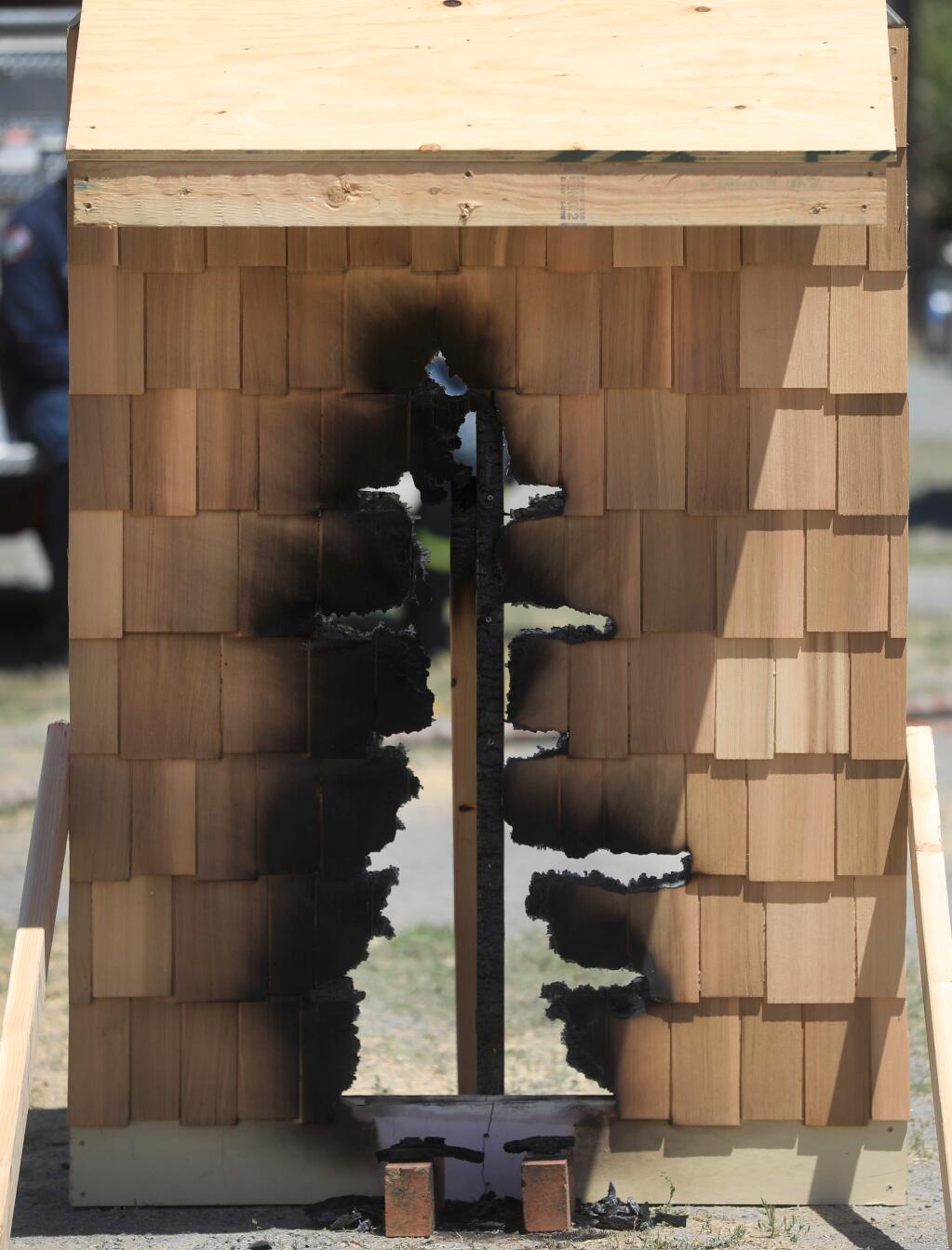 Panelized shingles were burned, Tuesday, June 18, 2019 at the Santa Rosa Junior College Public Safety Training Center in Windsor. (Kent Porter / The Press Democrat) 2019