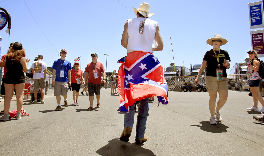 T.J. Woodward of Sonoma "Wanted to wear" his Confederate Flag at Sonoma Raceway in Sonoma, Friday June 26, 2015. (Kent Porter / Press Democrat) 2015
