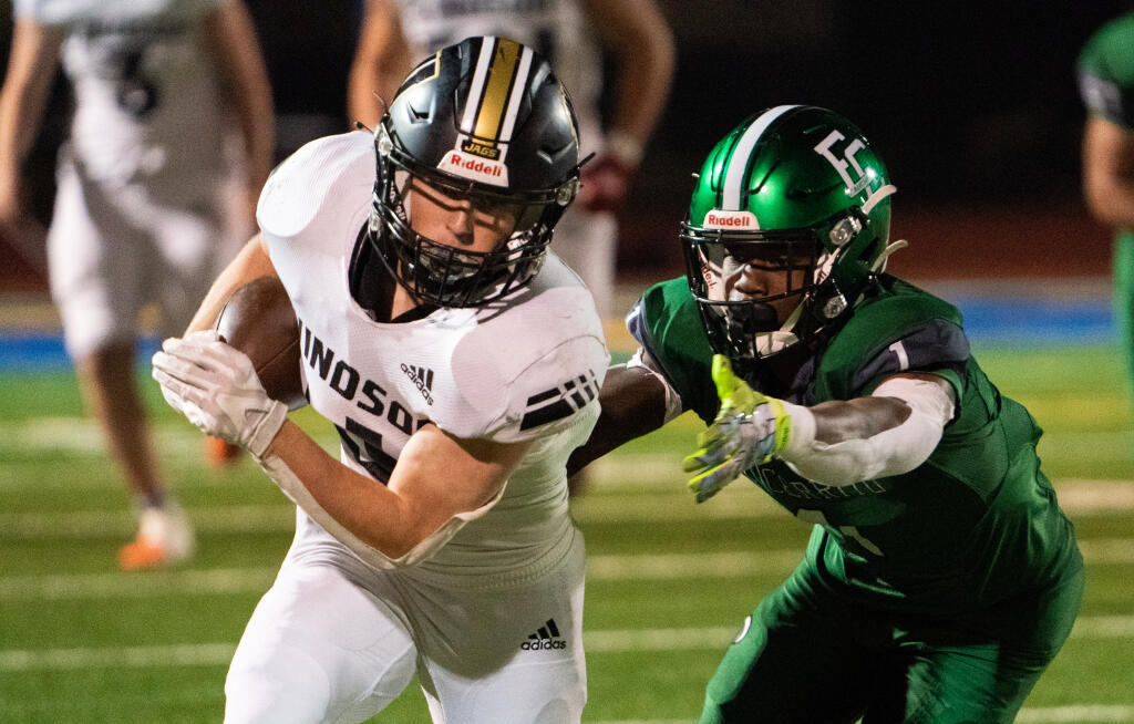 Windsor running back Max McFerren escapes El Cerritos defense for a crucial first down in the third quarter in the North Coast Section Division 3 finals game on Friday, Nov. 25, 2022 in Benicia. (Nicholas Vides / For The Press Democrat)