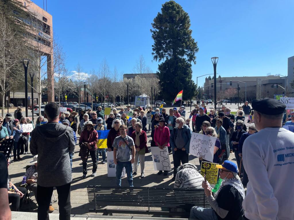 Nearly 100 attendees gathered during a rally in Courthouse Square in downtown Santa Rosa on Sunday, March 6, 2022 to stand in solidarity with the people of Ukraine. (Mya Constantino/The Press Democrat)